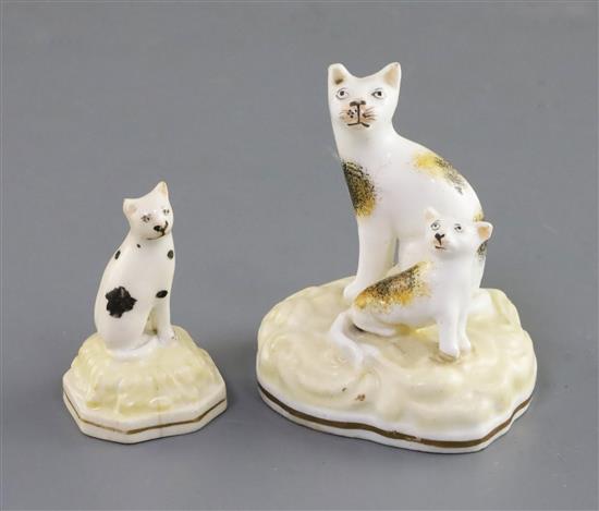 A Samuel Alcock group of a seated cat and kitten and a similar figure of a kitten, c.1840-50, H. 6.4cm and 4.7cm, slight faults